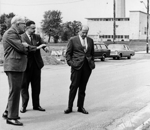Senator Gaylord Nelson, William Hansen, and University of Wisconsin-Stevens Point president Lee Dreyfus discuss at the Water Quality Lab that is to be built on the Stevens Point campus. Hanson, a former president of the University was considered to be the "father" of its Conservation school.