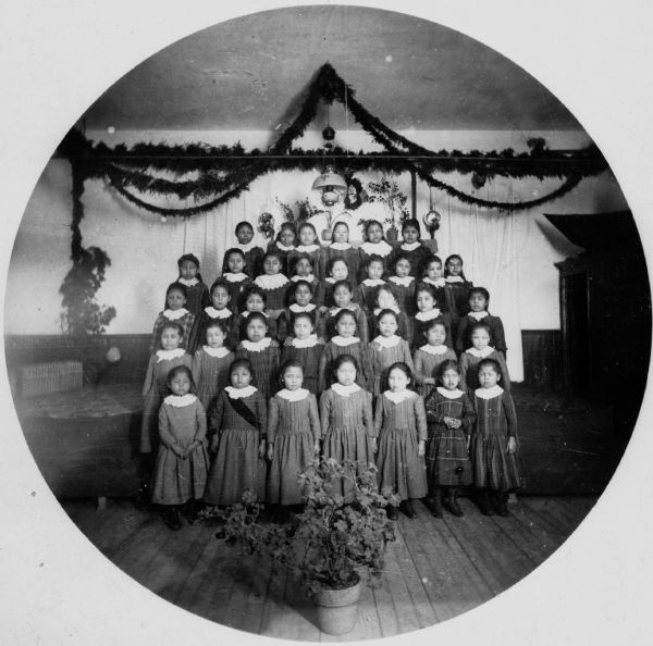 Group portrait of young girls who were students at the Lac du Flambeau Indian School.