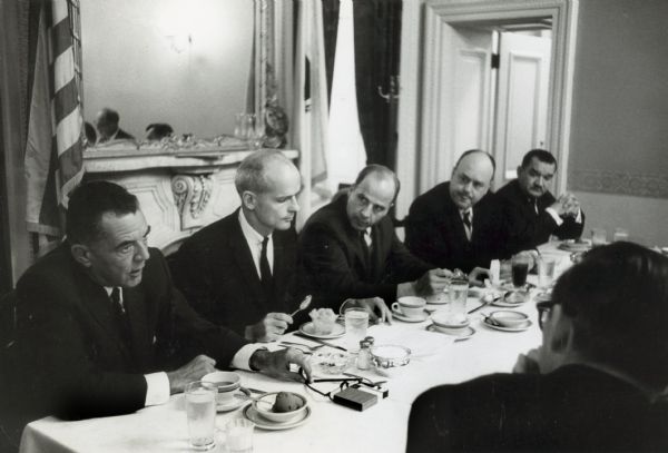 The Wisconsin Congressional delegation meets during a meal. Left to right they are: John Byrnes, William Proxmire, Gaylord Nelson, Melvin Laird, and Clement Zablocki. Although undated, this photograph was probably taken before Laird resigned to become the Secretary of Defense in January, 1969.