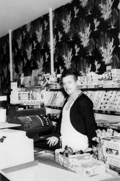 Walter Wolf Peltz in his grocery store.