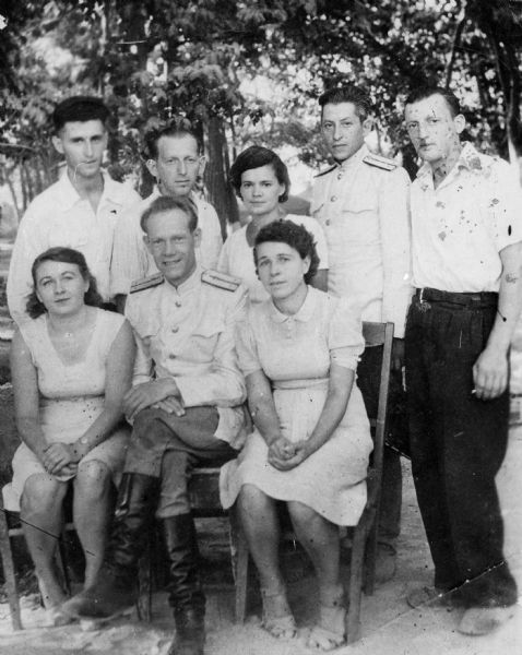 Fred Platner's co-workers and officers in a military camp; Tashkent, U.S.S.R. Fred Platner worked at the camp as a truck driver.