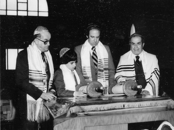 From left: Maurice Messerman, Randy Messerman, Howard Messerman, and Rabbi Mayer Relles at Randy's Bar Mitzvah at Anshe Poale Zedek Synagogue.