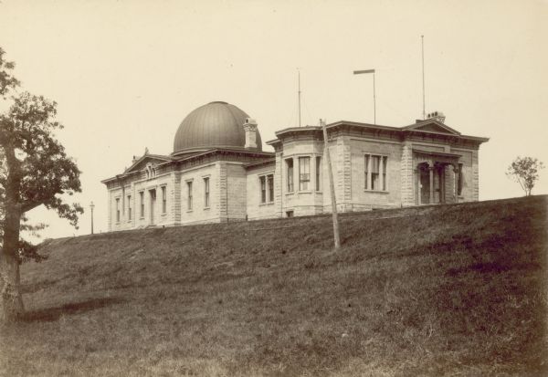 Exterior of Washburn Observatory at the University of Wisconsin-Madison, showing telephone wires.