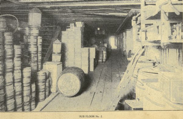 Interior of (Sub Floor No. 2) The F. Dohmen Company Wholesale Druggists. A salesman's catalog with removable screwed bindings and pages of note paper bound between catalog pages. (One of 13 halftones of the company's exterior and interior images included in catalog.)
