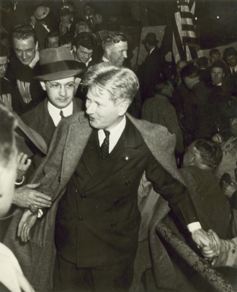 Governor Philip F. La Follette of Wisconsin on the night when he delivered his "National Progressives of America" speech. Behind him is Morris Rubin, editor of the <i>Progressive Magazine</i>.