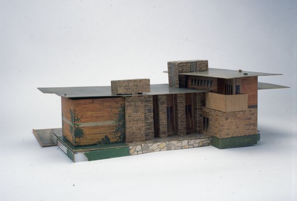 In 1938 <i>Life</i> magazine invited notable architects to design "dream homes" for four American families, each at a different income level. Each family was assigned two architects, one to design a "traditional" house and one a "modern" house. Wisconsin architect Frank Lloyd Wright prepared a modern design for a family in Minneapolis, Minnesota. Wright described the home, with its special privacies and conveniences, as "a Little Private Club."

The Minneapolis family, the Blackbourns, originally chose Wright's plan but could not come to an agreement with him on cost and the addition of a garage. The Blackbourns subsequently chose the traditional design of Royal Barry Wills. Wright recycled his plan the following year as the Bernard Schwartz house built in Two Rivers, Wisconsin.

At the same time, Life Houses of Chicago began selling models of all the dream homes through mail order and at retailers across the country. Madison retailer Harry S. Manchester, Inc. advertised the Wright-designed model for $1.00. Mary Williams of Madison likely purchased the model at Manchester's and treasured it for decades. In the 1980s Williams gave the model to a family friend from whom the Wisconsin Historical Society later acquired it. This is the only known example of its kind.

The model is made from color-lithographed pieces of light cardboard stock comprising floors, walls, and roofs. The maker's name, Warren Paper Products Co. of Lafayette, Indiana, is printed on the interior of one of the base pieces. The model is held together through a simple tab-and-slot construction, and it came with floor plans, two-dimensional scale furniture and appliance cut-outs, and an informational sheet.

