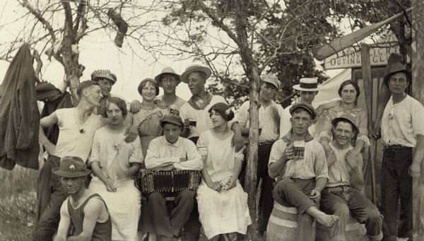 Group of people known as the "Moonlight Outing Club" at Muskego Lake.