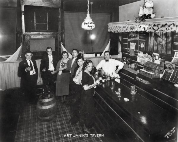 Elevated view of six customers celebrating Bootleg Days at Arthur Janik's tavern "The Balcony Inn" at Lincoln and 33rd Streets. Arthur Janik was the proprietor of this establishment from 1931 to 1937.