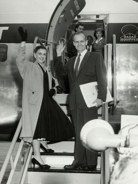 William and Ellen Proxmire boarding a plane.