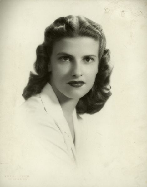 Head and shoulder portrait of a young Ellen Proxmire. The former Ellen Hodges Sawall married William Proxmire in 1956.
