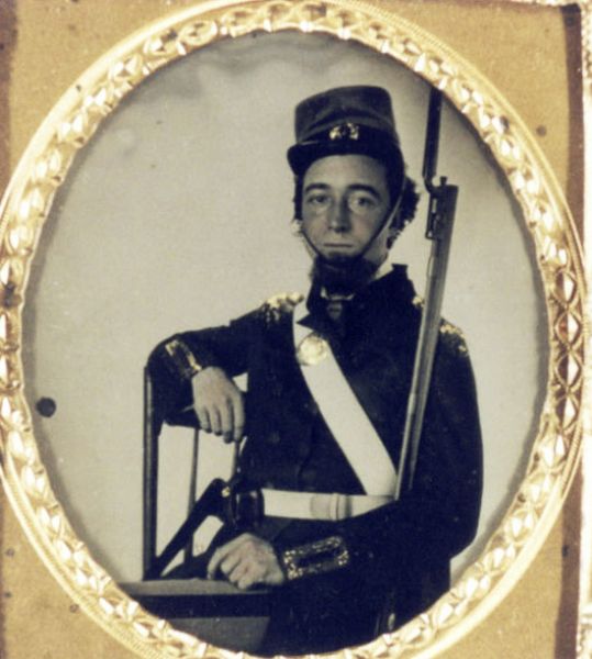 Waist-up studio portrait of George W. Driggs. Driggs served with the 8th Wisconsin and wrote the history of the regiment entitled "Opening the Mississippi."