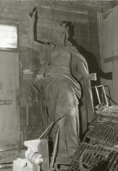 Germania Statue A statue of a woman is shown in storage after being removed from the Germania Building.