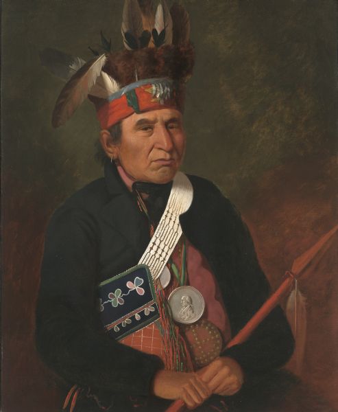Painted portrait of Souligny, a chief of the Menominees. He is depicted wearing a James Madison Peace Medal.