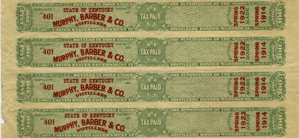 Forged labels imitating United States Government Revenue stamps seized by Prohibition Officers. The labels were used by bootleggers to make customers believe the liquor contained in the bottle was bonded whiskey -- in this case, whiskey distilled by Murphy, Barber, & Co. of Kentucky. These labels were seized in "Little Italy."