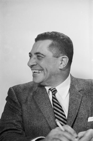 Vince Lombardi at a press conference at the Milwaukee Athletic Club, regarding the Green Bay Packers.