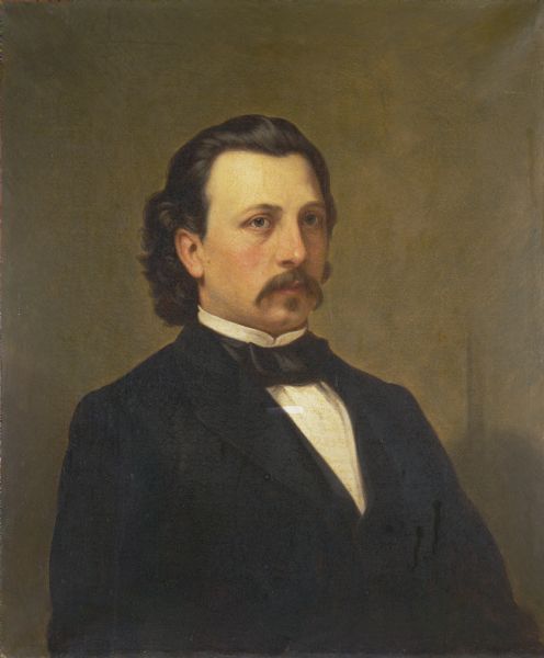 Waist-up portrait of Edward Salomon.