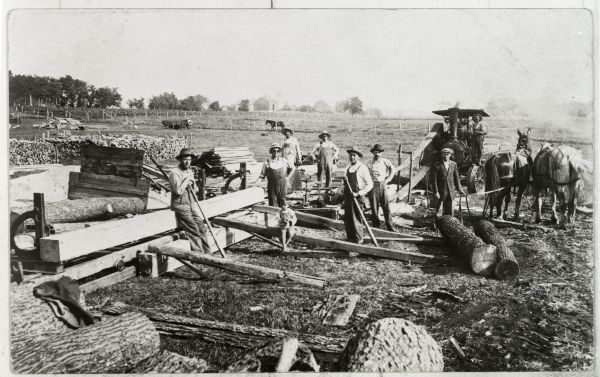 Chief Niles and other Brotherton men sawing logs.