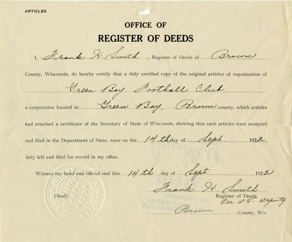 Document certifying that articles of incorporation for Green Bay Football Club were received by the Register of Deeds and filed with the Department of State. The document bears the Brown County Register of Deeds official seal.