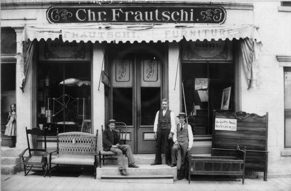 Members of the Frautschi family pose at the Christian Frautschi Furniture Store. From left to right are Alice, Irving, Christian and Arthur Frautschi.