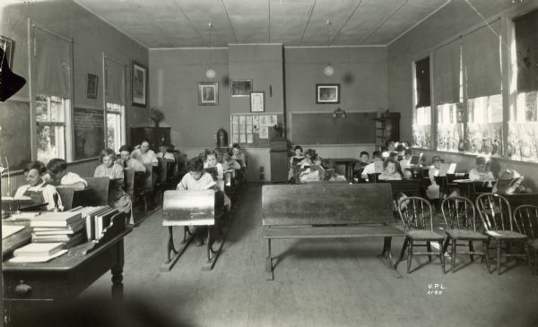 View from front of classroom of children sitting at desks at the Mendota Beach School.