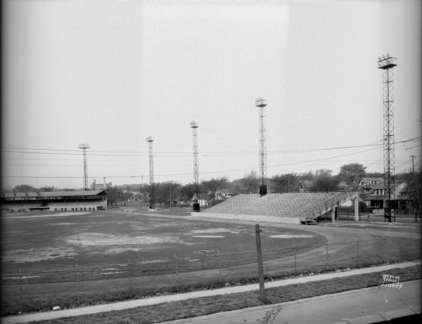 Breese Stevens Field Breese Stevens Athletic Field with lights on tall poles, looking toward E. Mifflin Street. Houses are in the background. (Section of panorama.)