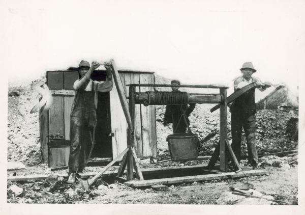 Early Wisconsin lead miners using a Pioneer Windlass.
