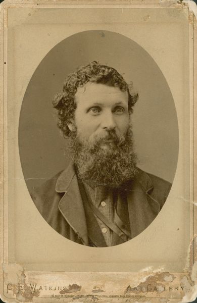 Head and shoulders oval framed portrait of John Muir (1838-1914).