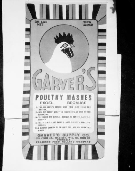 Garver's Supply Co., rooster head featured on 25 lbs feed sack label — "Garver's Poultry Mashes, 3220 Atwood Ave., Madison, Wis. Tel. BADGER 747, Formerly Economy Feed Milling Company, Fulton Bags+Minneapolis."
