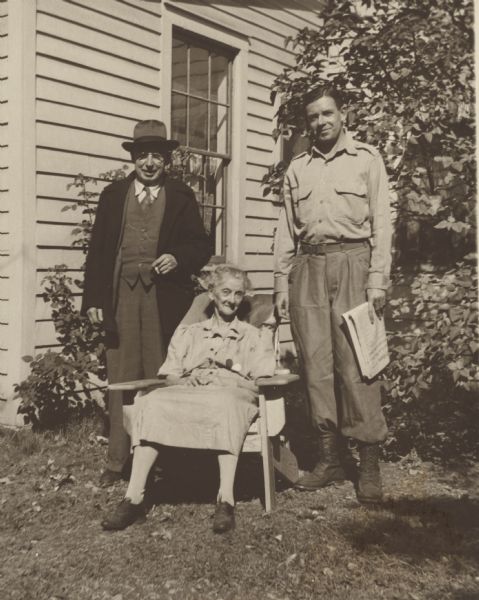 Portrait of Homer Bigart with elderly couple. Bigart was an award-winning journalist with the "New York Herald-Tribune" and the "New York Times".