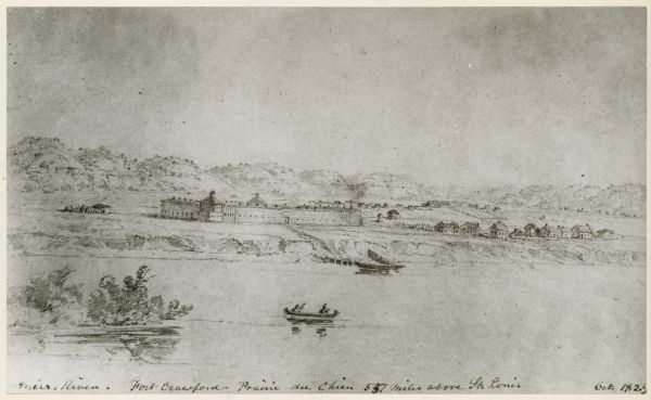 Fort Crawford as drawn by Seth Eastman. People are in a canoe in the river in the foreground. Across the river is the fort, other buildings around the fort, and in the distance are hills. Caption reads: "Miss. River. Fort Crawford — Prairie du Chien 557 miles above St. Louis."