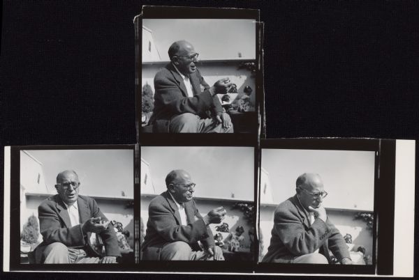 Four photographs of Samuel Ornitz Four photographs of screenwriter Samuel Ornitz from either the late 1940s or 1950s. He is wearing a suit coat and tie and sits in a garden. Ornitz is talking and gesturing in three photographs - he holds his chin in one hand in the fourth. Two little girls can be seen in the background.