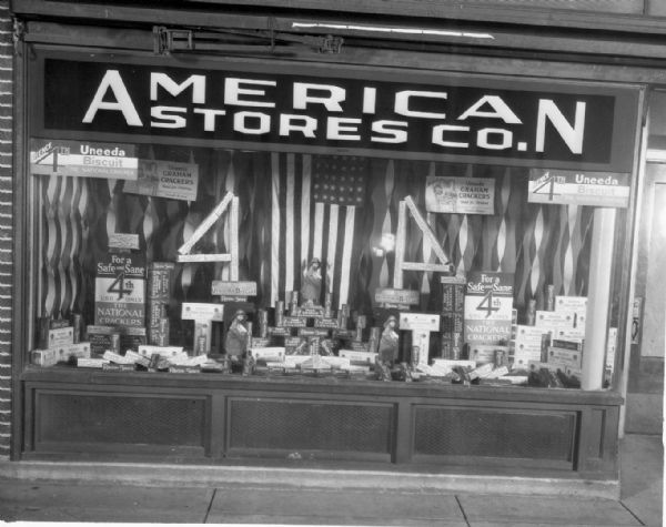 A&P Tea Co. display window, American Stores Company, "Uneeda Biscuit." National Biscuit Company (Nabisco), 4th of July.