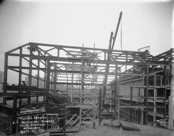 View from roof of the steel frame of the Capitol Theatre, located at 211 State Street in it's initial construction. The work was done by J.C. Theilacker Co. Milwaukee, American Bridge Company.