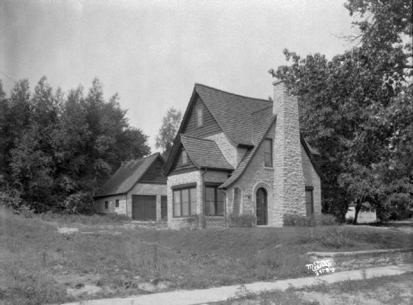 House at 454 Virginia Terrace, view from the left across sidewalk.