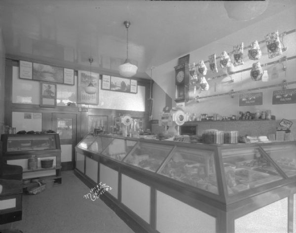 Interior of Levenick Brothers Meat Market, showing a Toledo Scale. 1406 Williamson Street.