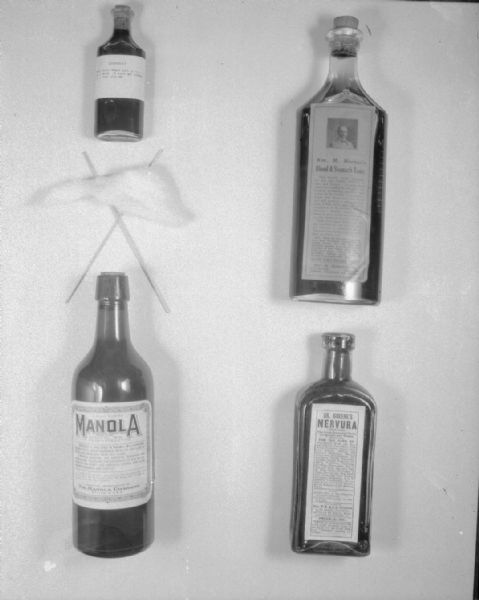 Four bottles of quack medicine taken for for William S. Marshall.