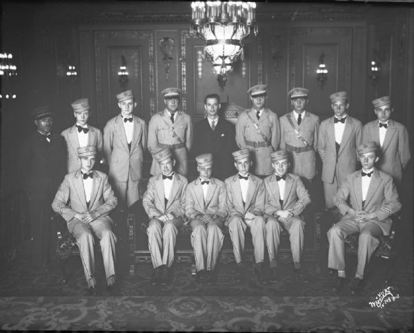Group portrait of Orpheum theater ushers in uniform.