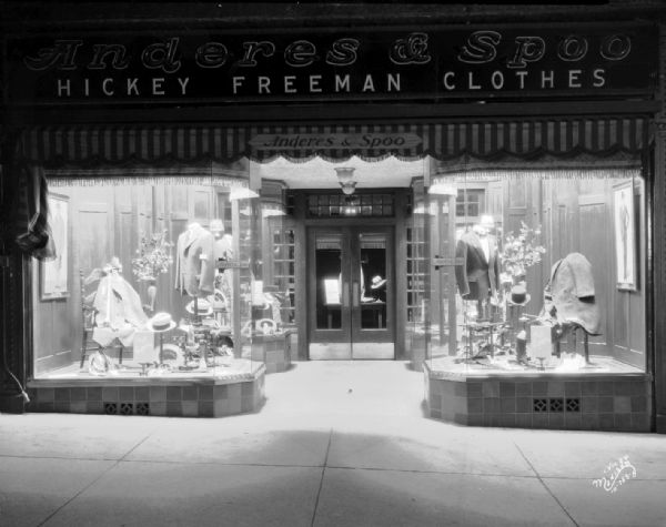 View of the window display at Anderes & Spoo, Hickey Freeman Clothes, a men's clothing store at 18 North Carroll Street.