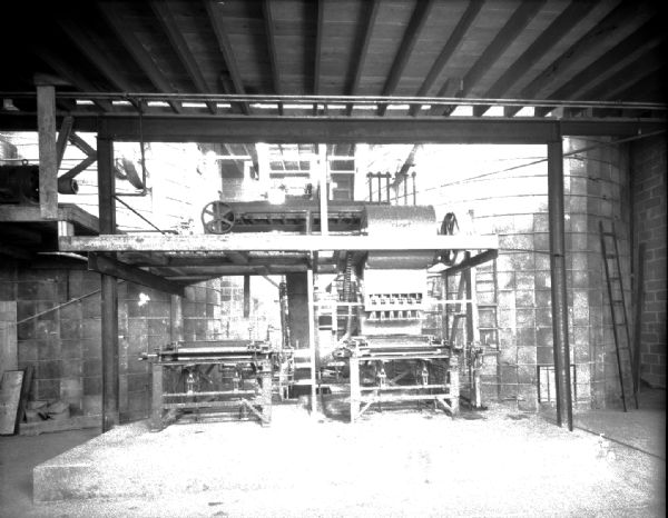 Concrete block machine as seen from the front, at Madison Silo Co.