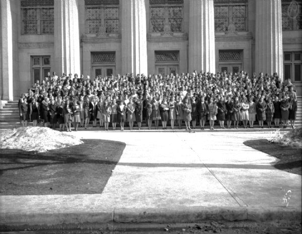 Central High School girls' club group portrait in front of the Masonic Temple, 301 Wisconsin Avenue.