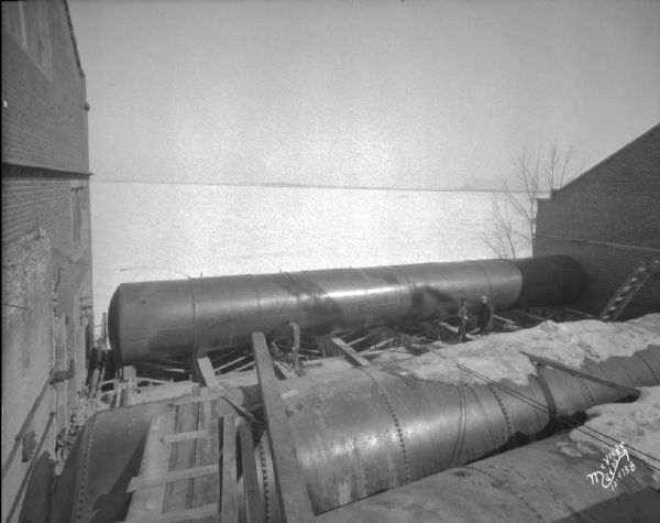 Tank in place at Hydraulics Laboratory, 660 N. Park Street. Taken from hill looking toward Lake Mendota, at the University of Wisconsin.