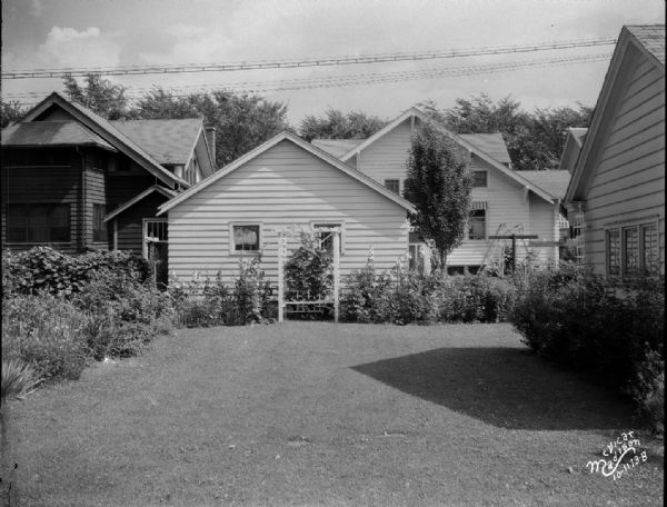Backyard landscaping of a house on Van Hise Avenue taken for McKay Nursery.