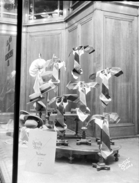 Olson Veerheusen display window, 7-9 N Pinckney Street, featuring Varsity Stripe neckwear.