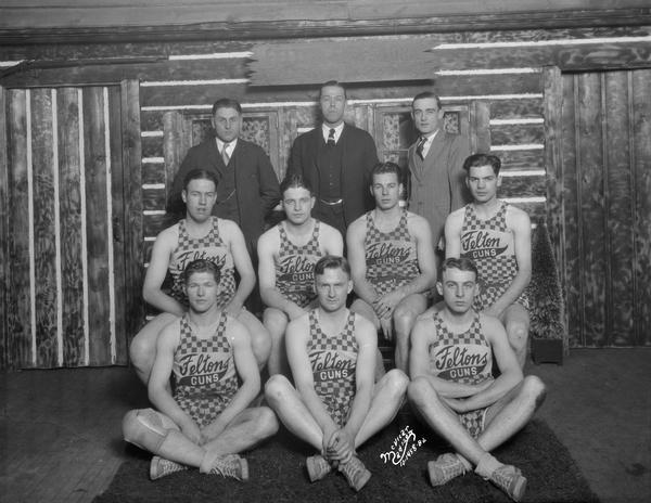 Felton's gun store basketball team, with three coaches.