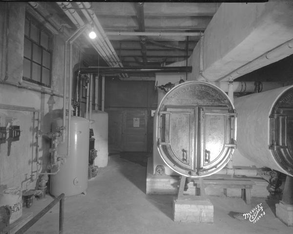 First Congregational Church boiler room, showing permutet water softener and back side of boilers.