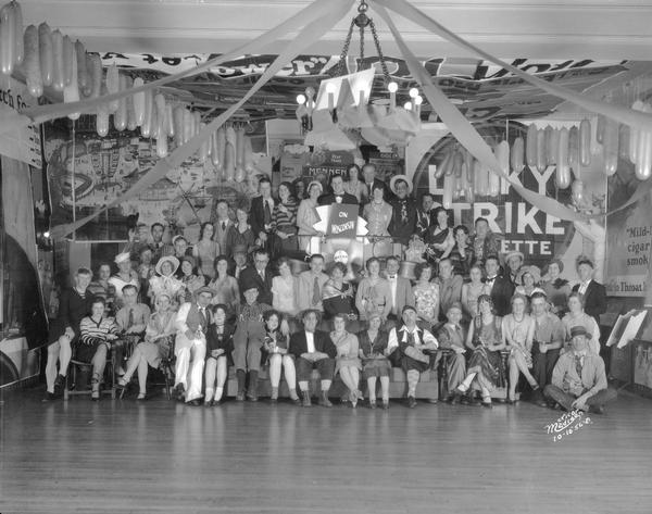 Acacia House Fraternity Party, with group portrait of attendees in costume.