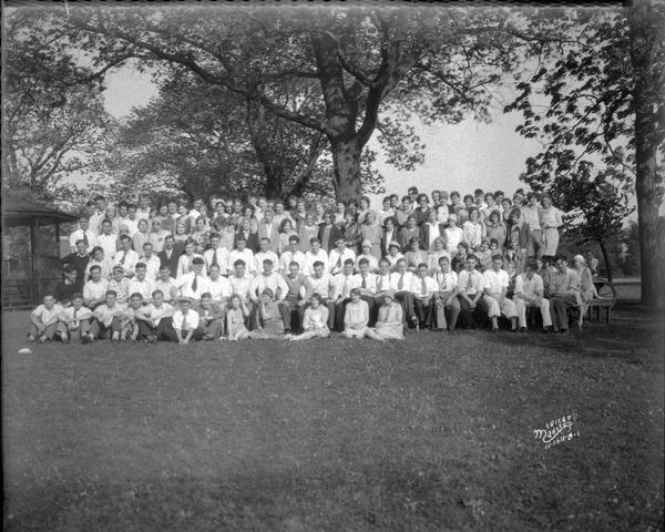 Group portrait of Madison College students on a picnic at Vilas Park.