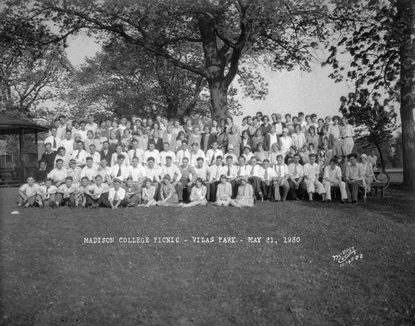 Group portrait of Madison College students on a picnic at Vilas Park. Alternate view "Madison College picnic, Vilas Park, May 21, 1930" typed on negative.