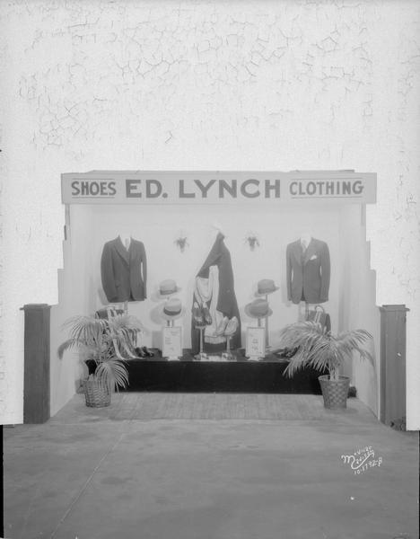 Ed Lynch booth at ESBMA (East Side Business Men's Association).  Showing men's shoes and clothing.