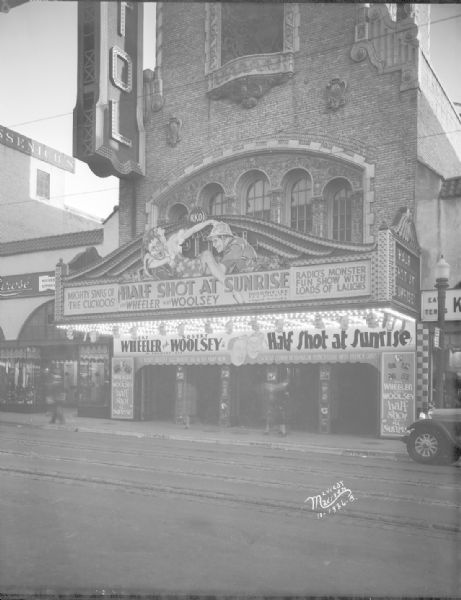 Capitol Theatre marquee featuring Bert Wheeler and Robert Woolsey in "Half Shot at Sunrise." Next to the theater on the left is the Lurose women's clothing store, at 205 State Street.